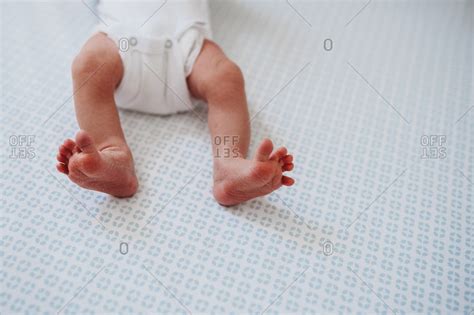 Legs And Feet Of A Newborn Baby Stock Photo Offset