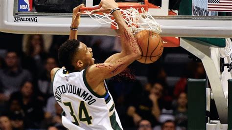 Giannis antetokounmpo dunks over two defenders. Giannis Antetokounmpo Top 10 Poster Dunk - ShareonSport.com