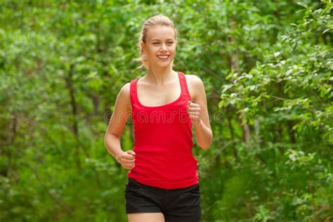 Young Woman Jogging Outdoors Stock Image Image Of Energy Forest