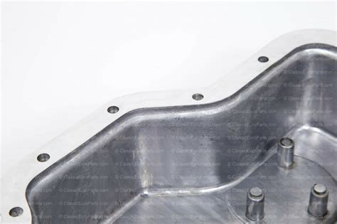 Use a piece of chalk and draw an arrow to mark the running direction of the timing belt before removing it from. Lower oil pan for E30 with M40 and M42 engine ...