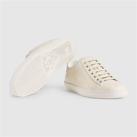 Womens Gg Embossed Ace Sneaker In White Leather Gucci Us