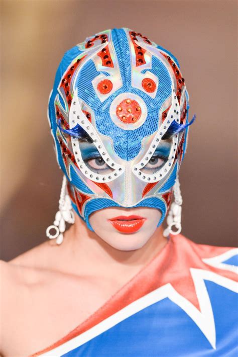 According to a concept drawing, he was going to have a yellow mask and a yellow cape (but with the same designs), but later it got changed to the current red one. Jean Paul Gaultier | Luchador mask, Mexican wrestler, Ski ...