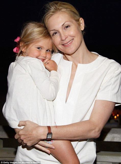 Holding On Tight Kelly Rutherford Scoops Her Children Into Her Arms At
