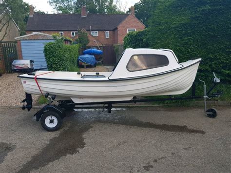12ft Fishing Boat And Mariner 4hp Outboard On Road Trailer In Bidford