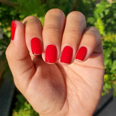 red polish nail polish up hairdos adrenaline vibrant red red nails old hollywood essie