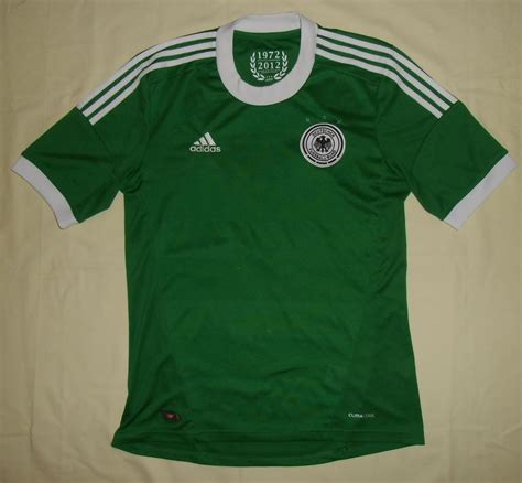 Find great deals on the latest shirts and shorts, as well as retro classics! Germany Away football shirt 2012 - 2013.