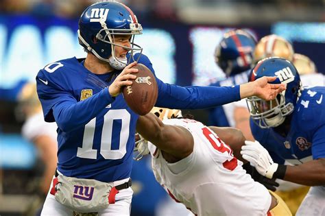 Eli Manning Jabs Tiki Barber Says He Wants To Retire As A Giant Big