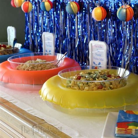 Here are a few other summer christmas party ideas: Christmas Cookies in July The Partiologist-Pool Party! Cute buffet table set up with small float ...