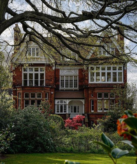 Double-fronted Victorian house with bay windows facing the garden