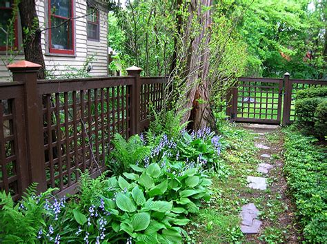 Lattice fence panels are ideal as informal garden fencing and for climbing plants. Good Neighbor Square Lattice Garden Fence By Elyria Fence
