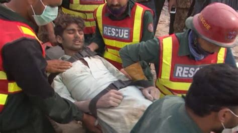 survivor rescued from rubble 17 hours after factory collapse