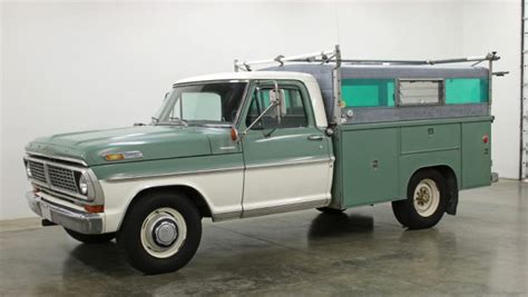 The adventurer 86fb truck camper offers a rear kitchen area with a three burner range, and double kitchen sink on one side of the camper and a booth dinette and refrigerator on the other side. Skaug Bed Equipped: 1970 Ford F250 Camper Special