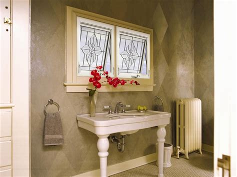 This abstract window is a perfect complement to a modern master bathroom. This country bathroom has antique hardware with a modern look. The leaded glass windows give the ...