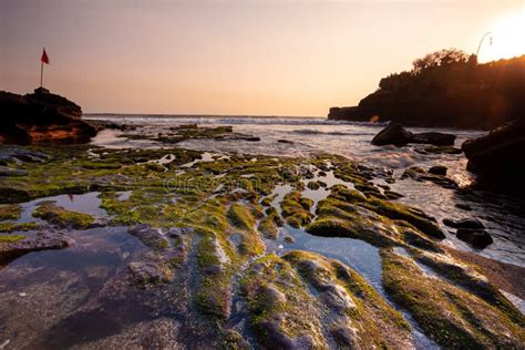 Beautiful Sunset At Bali View With Cloudy Sky At Tanah Lot Bali Stock