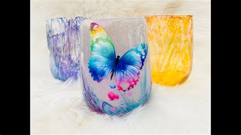 Rubbing alcohol or isopropyl alcohol is a great way to blend your inks, and you typically only need a small amount at a time check this guide out for a little extra help: Crackle alcohol ink glitter wine tumbler - YouTube