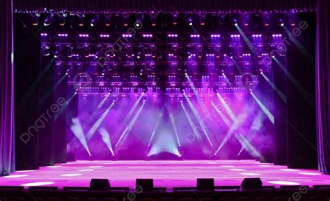 Illuminated Empty Concert Stage With Smoke And Rays Of Light Photo