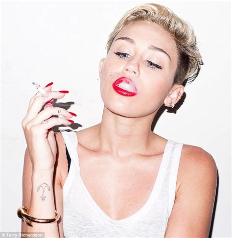 Miley Cyrus Smokes A Cigarette And Grabs Crotch In Edgy Terry
