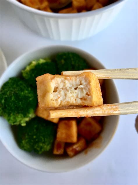 The air fryer makes the tofu chewy and slightly crispy, with no added oil. Air Fried Tofu in a Sweet Sriracha Sauce - a quick & easy vegan dinner!