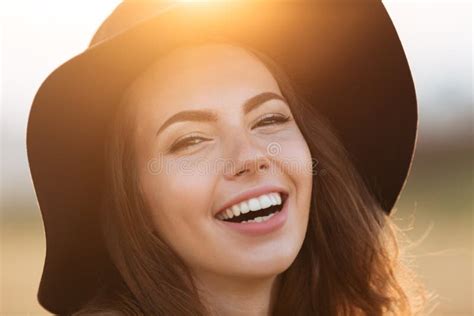 Close Up Portrait Of A Joyful Girl In Hat Laughing Stock Image Image