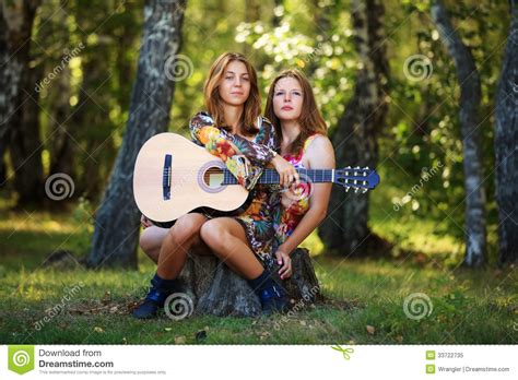 Hippie Girls With Guitar In A Forest Stock Image Image