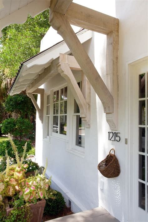 This set of trellises is from the casa cristina collection. Beautiful corbels for a garage trellis | House exterior ...