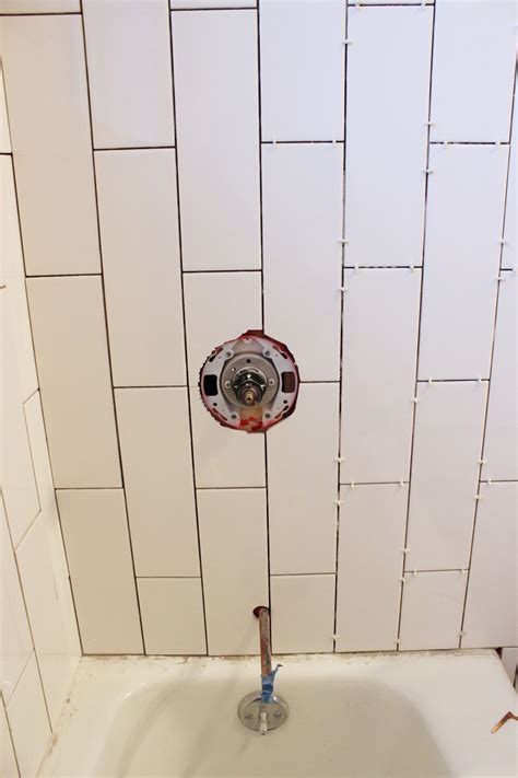 Marble adds a touch of the roman spa decadence, while fluid grey river stones suggest an extension of the natural surrounding environment. How to Tile a Shower/Tub Surround, Part 1: Laying the Tile