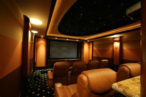 Luxurious Media Room With Comfortable Tiered Theater Seating Home