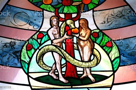 Colorful Church Window With Adam And Eve Stock Photo Download Image