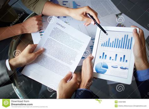 Begin by discussing the research question and talking about whether it was answered in the research paper based on the results. Discussing Documents Stock Photos - Image: 34591883