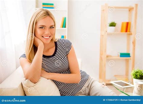 Portrait Of Beautiful Happy Smiling Relaxed Girl Sitting On Couch Stock Image Image Of Emotion