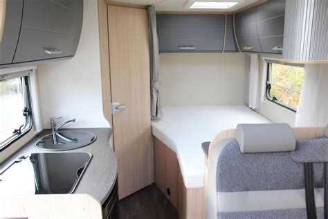 Compact And Luxurious 2 Person Camper With Fixed Bed In The Back From