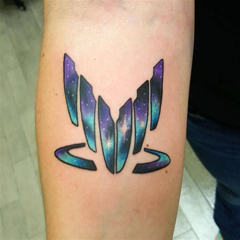 Our experienced tattoo team is one of a kind. Galaxy Spectre symbol done by Shane Olds at Studio XIII in ...