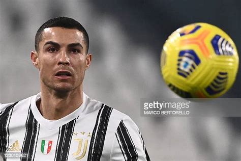 Juventus Portuguese Forward Cristiano Ronaldo Eyes The Ball During