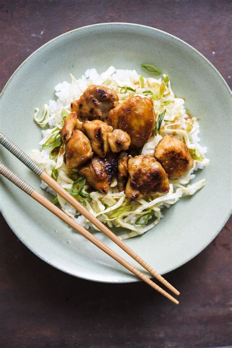 Juicy pan fried chicken thigh cooked in a sweet teriyaki sauce with a garlic kick served on a bed of fluffy, japanese style white rice then topped with chopped. Chicken Teriyaki Rice Bowls (Teriyaki Donburi ...