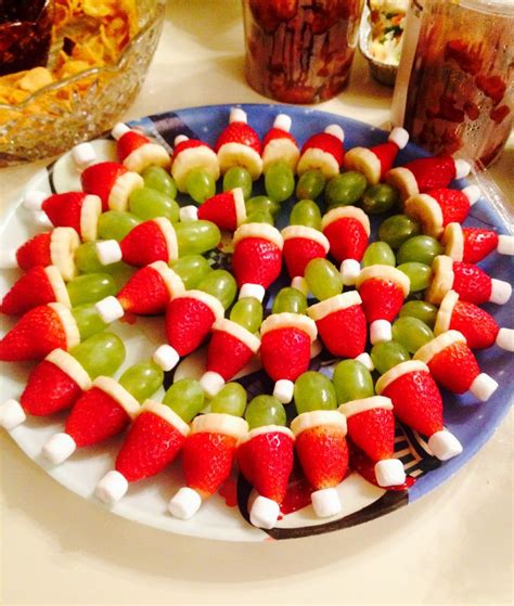 Fruit trays do not have to be elaborate productions with sculptures of tropical fruit surrounded by cascading berry waterfalls. Grinch fruit kabobs I made | "You're like Martha Stewarts daughter" | Pinterest | Christmas ...
