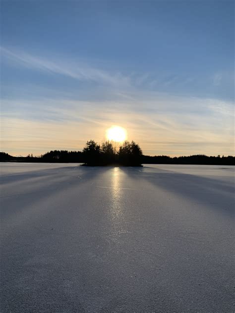 Sunset Behind Island In Frozen Lake In Winter The Best Free Stock