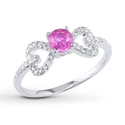 Pink diamond engagement rings come in a wide range of tones and designs, making it easy to find the right jewelry piece for your beloved. Unique Half Carat Pink Sapphire and Diamond Engagement Ring in White Gold - JeenJewels