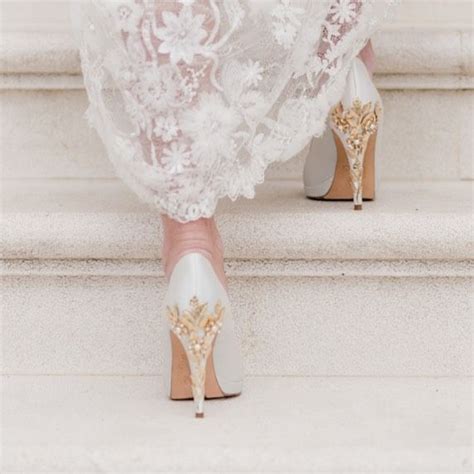 A Brides Wedding Dress And Shoes On The Steps