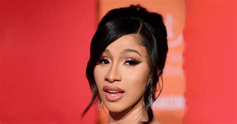 As she's touching her hair in appreciation, you can see that each of her. Cardi B WAP Grammy Performance With Pink Pixie Haircut