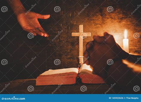 Vintage Photo Of Hand With Bible Praying Hands Folded In Prayer On A