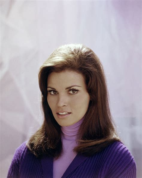 Raquel Welch 8x10 Photo In Purple Sweater Photographs