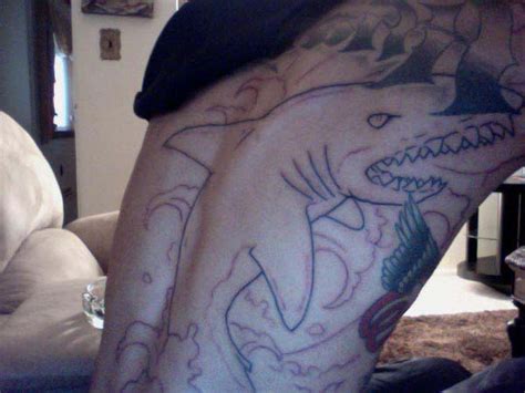 Shark, khalifa, a dreamcatcher, and a tepee. angiesartystuff: wiz khalifa tattoos meanings