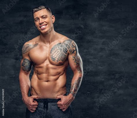 Muscular Man Fitness Model With Tattoo On His Chest Stockfotos Und