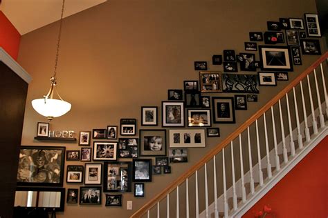 Gilded wooden frames for pictures on abstract blue background. 33+ Stairway Gallery Wall Ideas To Get You Inspired ...