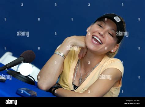 Anna Kournikova Smiles While Being Interviewed About Current Events In