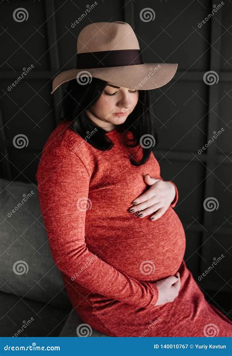 Pregnant Woman Inside Room Gently Strokes Belly Stock Image Image Of