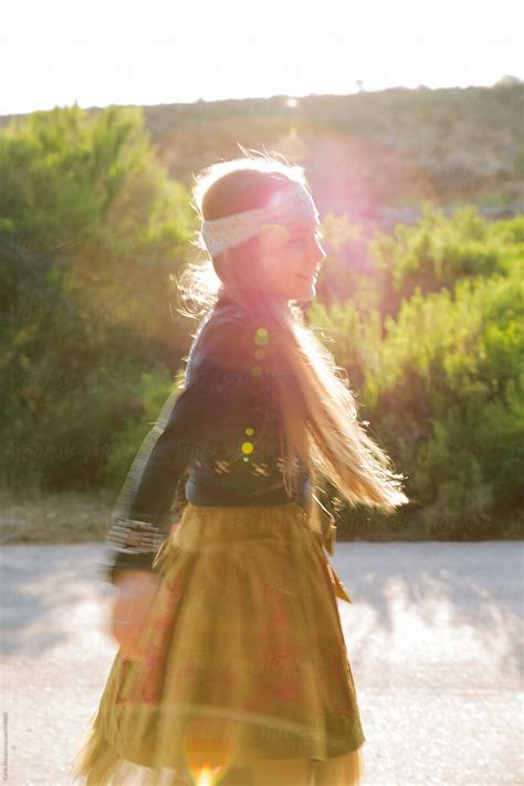 Beautiful Bohemian Girl Dancing In The Sunlight By Stocksy Contributor Curtis Kim Stocksy