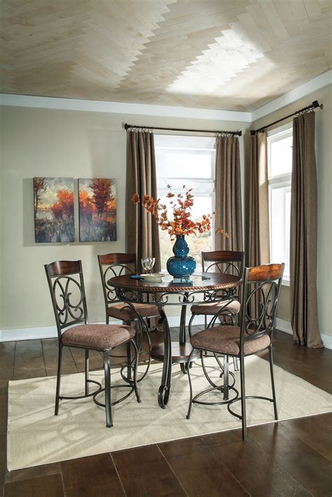 Our selection of elegant pub height dining tables comes in various sizes and colors, making it especially easy to locate a piece that matches your needs perfectly. Glambrey Round Dining Room Counter Height Table Set from ...