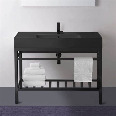 A style renowned for emphasizing symmetrical patterns and modern finishes, incorporating art deco pieces is a great way to make. Modern Matte Black Ceramic Console Sink and Matte Black ...