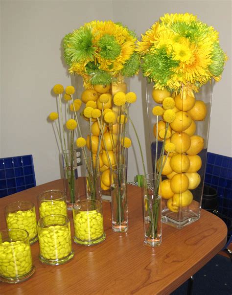 If you mix any of the red family with it, you'll lean toward oranges; blue and yellow table decorations | Wedding table ...